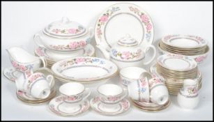 A good 20th century Royal Worcester dinner and tea service comprising cups, saucers, plates,