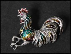 A 925 silver plique a jour enamel figural brooch in the form of  a cockerel set with marcasite