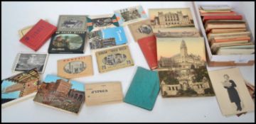 A collection of vintage 20th century Souvenir postcard sets from around the the world to include