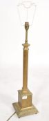 A 19th century large brass column table lamp. The classical column having a square base with