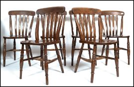 A set of six 19th century Victorian beech and elm Windsor dinning chairs. Raised on turned legs with
