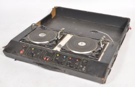A set of vintage 1970's DJ Decks - record player by being complete in the carry case. The silvered