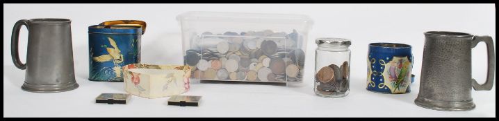 A large collection of British and  World coins and tokens dating from the 19th century to include