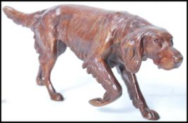 Hunting interest - A 20th century Continental solid cast cold painted bronze figural sporting
