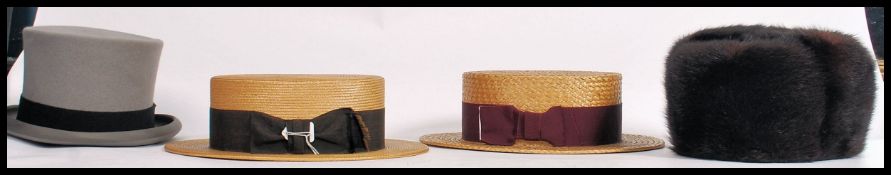 A vintage 20th century ladies fur hat together with two straw boaters one by Bonton Ivy and the