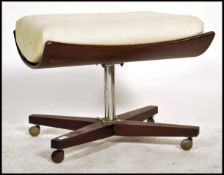 A retro 20th century teak wood ottoman footstool by Kofod-Larsen for G-Plan dressing. Raised on teak