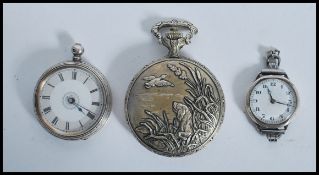 A silver continental pocket watch having an enamel face with faceted hands and a roman numeral