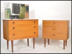 A retro 20th century teak wood dressing table and matching chest of drawers  each with tapering legs