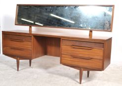 A mid century Danish inspired teak wood dressing t