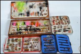 A collection of over 600 fly fishing flies of various form held within cases. Please see images.