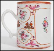 A late 17th / early 18th century circa 1800 Chinese porcelain tankard with famille rose decoration