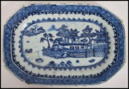 A late 18th early 19th century Oriental Chinese blue and white willow pattern tray dish believed