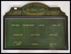 An unusual retro painted wooden sign for J Smith of London 1905. Two tone black and green