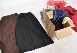 A collection of vintage 1970s retro ladies clothes to include three full length skirts one having
