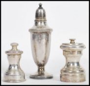 A Fisher Sterling silver pepperette with makers label to base, weight 37.7g together with a silver