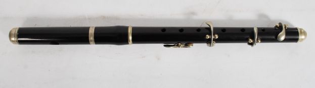 A 19th century Victorian rosewood piccolo with nickel plated  metal keys, no makers marks visible.