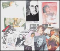 Music Autographs;  A collection of assorted signed publicity photographs, all by music stars /