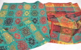 A retro 20th century throw / cover heavily influenced by South American designs set on green