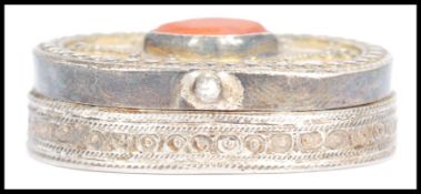 A vintage Kazakhstan silver gilt and Carnelian snuff box from Russian central Asia, fitted with a