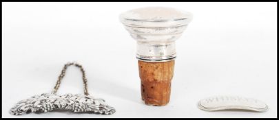 A Georgian silver hallmarked Whiskey decanter label, London hallmarks by 1822, date letter g