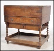 An early 20th century oak cased Artists work box, hinged top opening to reveal a fully appointed