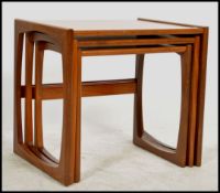 A G-Plan retro teak wood 1970's graduating nest of tables in the Quadrille pattern. The tables