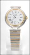 A Gents Dunhill stainless steel quartz watch with bracelet, Roman numeral chapter ring, sweep