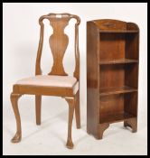 A 1930's Queen Anne walnut bedroom chair raised on cabriole legs with pad feet together with an