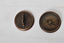 An unusual 20th century Gilbert Sundial - brass pocked cased sundial and compass being of roundel