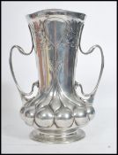 A 19th century Art Nouveau Orivit pewter twin handled baluster vase, serial number 2162. Stamped
