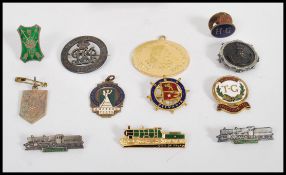 A group of vintage 20th century pin badges to include Home Guard, WW1 sweet heart brooch, enamel