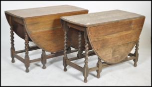 A 1930's oak barley twist drop leaf / gate leg act