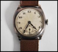 A silver hallmarked early 20th century Dennison gentleman's trench watch bearing hallmarks for