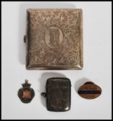A silver hallmarked vesta match case and strike along with a unmarked silver cheroot case, a
