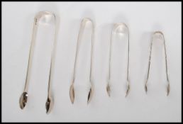 A stunning Art Deco silver hallmarked silver five piece dressing table set. The matching set