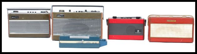 A collection of four vintage mid 20th century Roberts radios together with a vintage Junior Recorder