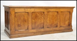 A good 20th century Jacobean revival large solid golden oak coffer chest. Of large rectangular