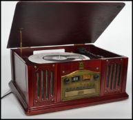 A retro style 20th century wooden cased hi-fi system having record deck, radio and Cd player etc