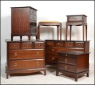 A collection of Stag ' minstrel ' pattern mahogany bedroom furniture to include a pair of chest of