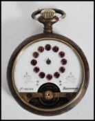 A vintage early 20th century Ancre pocket watch having an enamel face with amethyst backed