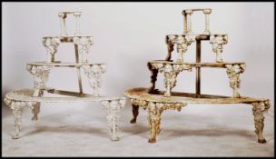 A rare pair of 19th cenury Coalbrookdale manner 4 tiered cast iron lattice and pierced worked