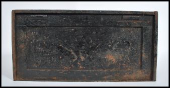 A 19th century heavy cast iron strong box, panelled sides, brass drop swag carry handles to ends,