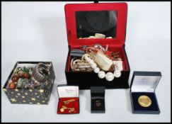 A collection of vintage costume jewellery to include bracelets bangles necklaces rings watches etc.