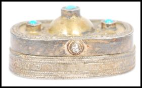 A vintage Kazakhstan silver gilt and Carnelian snuff box from Russian central Asia, fitted with a