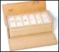 A good collection of vintage 20th century Scientific microscope sample slides contained within a