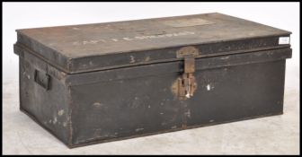 A 19th century ebonised military tin trunk with hinged top bearing notation for Captain Sheppard.