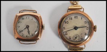 Two vintage 20th century hallmarked 9ct gold watches one set to a rolled fold strap having a