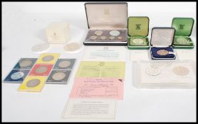 A collection of proof coins to include a First Coinage Of The British Virgin Islands Proof Set,