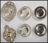 An early 20th century continental silver plated pierced and cast rococo soap dish, the centre with