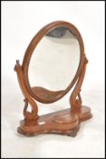 A Victorian mahogany toilet swing dressing mirror